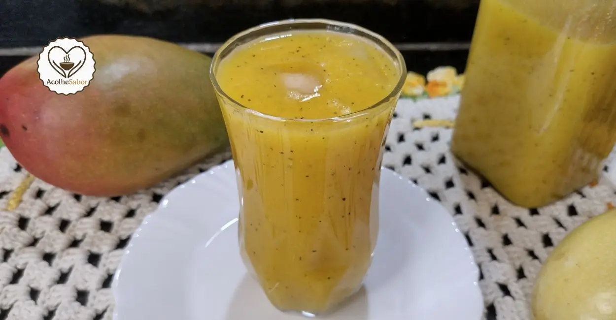 Suco de manga com maracujá sem lactose servido gelado.